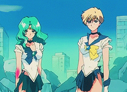 Two Anime Characters Standing in a City