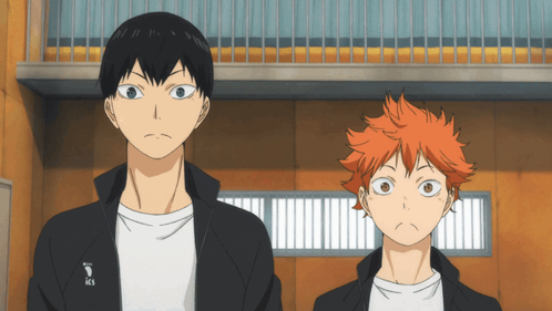 Two Anime Characters Standing Next To Each Other With One Wearing A Jacket That Says Ics On It GIF