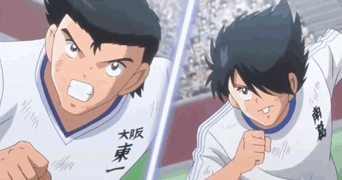 Two Anime Characters With Chinese Writing on Shirts