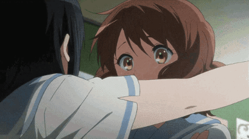 Two Anime Girls Are Hugging Each Other And One Has A Blue And White Striped Shirt GIF