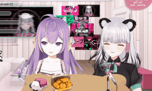 Two Anime Girls Are Sitting At A Table With A Box Of Fried Chicken GIF