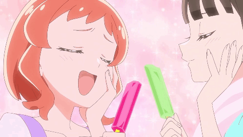 Two Anime Girls Are Standing Next To Each Other And One Is Holding An Ice Cream Bar GIF