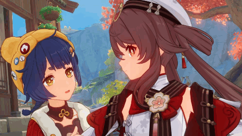 Two Anime Girls Are Standing Next To Each Other And One Is Wearing A Yellow Hat GIF