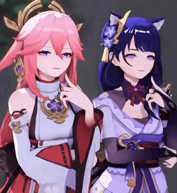 two anime girls are standing next to each other and one of them has a cat ear .