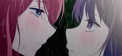 Two Anime Girls Are Standing Next To Each Other In The Rain And Kissing . GIF