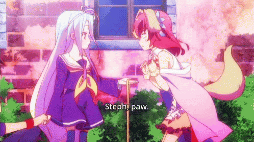Two Anime Girls In Front Of Brick Building GIF