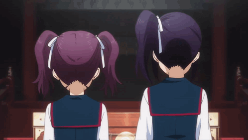 Two Anime Girls One With Crest on Chest
