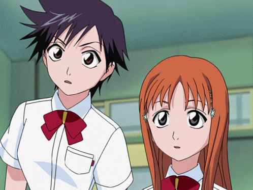 Two Anime Girls Standing Next To Each Other GIF
