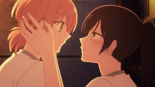 Two Anime Girls Touching Each Other 'S Faces With Their Hands GIF