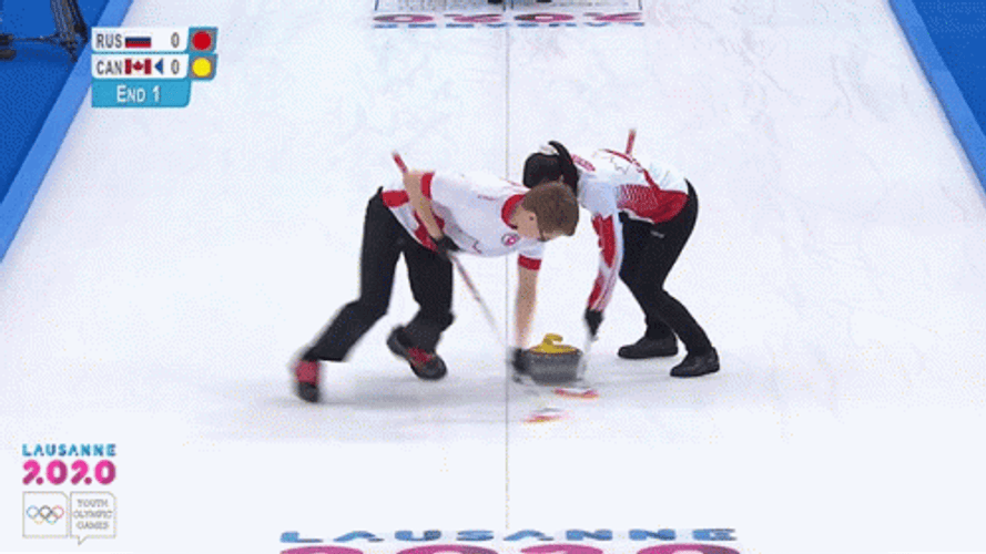 Two Athletes Sweeping Curling Stone GIF