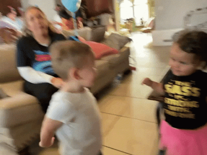 Two Babies Fist Bump Each Other