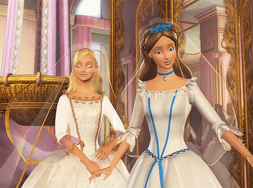 Two Barbie Dolls Standing Next to Each Other