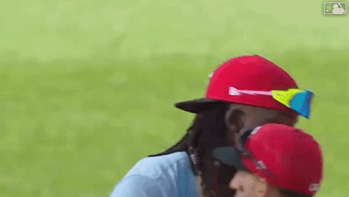 Two Baseball Players Hugging GIF