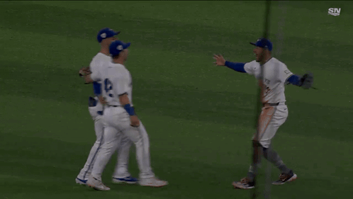 Two Baseball Players Hugging, One With 42
