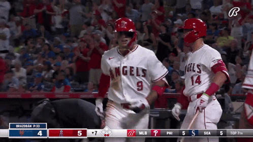 Two Baseball Players in Angels Uniforms Celebrating