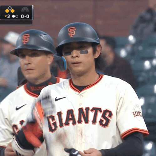 Two Baseball Players in Giants Uniforms
