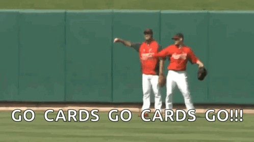 Two Baseball Players On A Field With The Words Go Cards Go Cards Go Written On The Bottom GIF