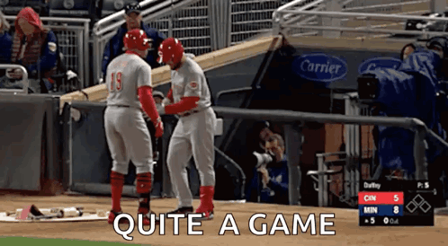 Two Baseball Players On The Field With Quite A Game Written On The Bottom GIF