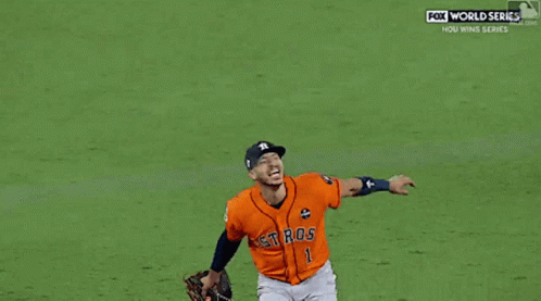 Two Baseball Players One Of Whom Has The Number 27 On His Back GIF