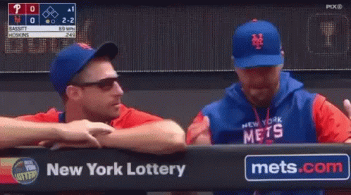 Two Baseball Players Shake Hands Before New York Lottery Ad