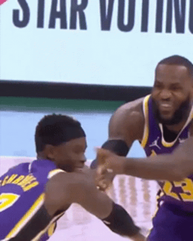 Two Basketball Players Are Playing A Game And One Of Them Is Wearing A Number 23 Jersey GIF