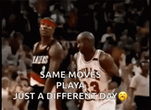 two basketball players are playing a game and one of them is wearing a number 33 jersey .