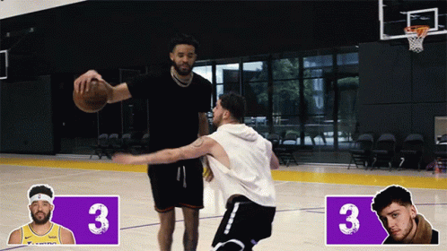 Two Basketball Players Are Playing On A Court With The Number 3 On The Side GIF