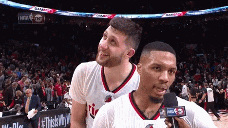 Two NBA Players Talking Into Microphone GIF