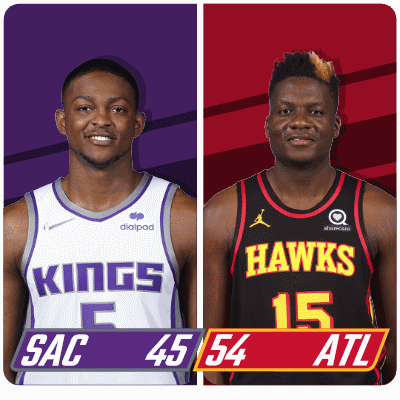 Two Basketball Players For The Kings And Hawks GIF