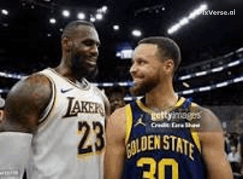 two basketball players , lebron james and stephen curry , are standing next to each other and smiling .
