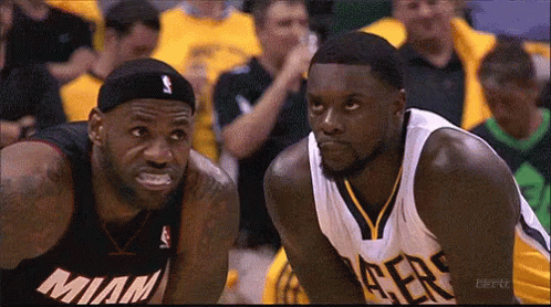 Two Basketball Players One in Miami Jersey