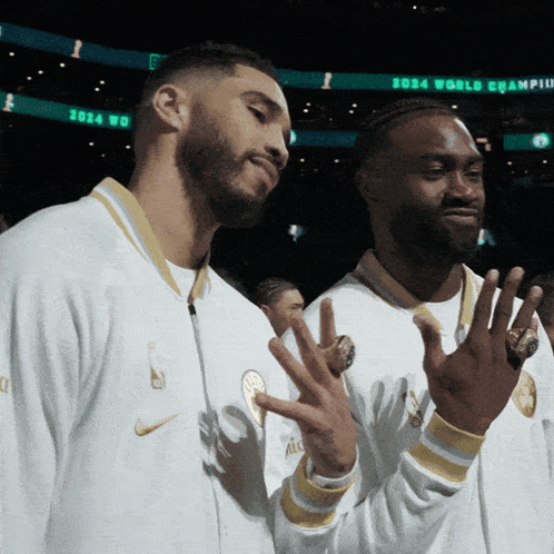 Two Basketball Players Posing GIF