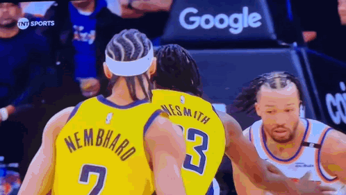 Two Basketball Players Talking