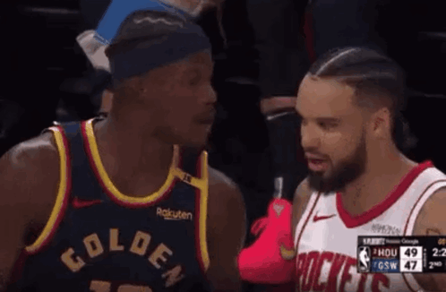 Two Basketball Players Talking
