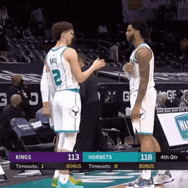 Two Basketball Players Talking GIF