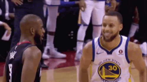 Two Basketball Players Together on Court