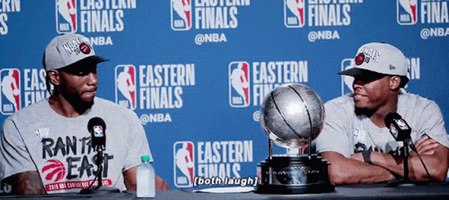 Two Basketball Players With Trophy GIF