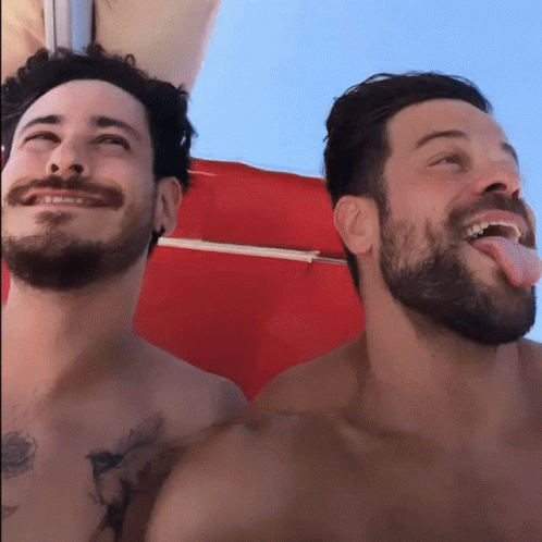 Two Bearded Men, One Sticking Tongue Out