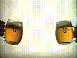 Two Beer Mugs Poured Into Glass