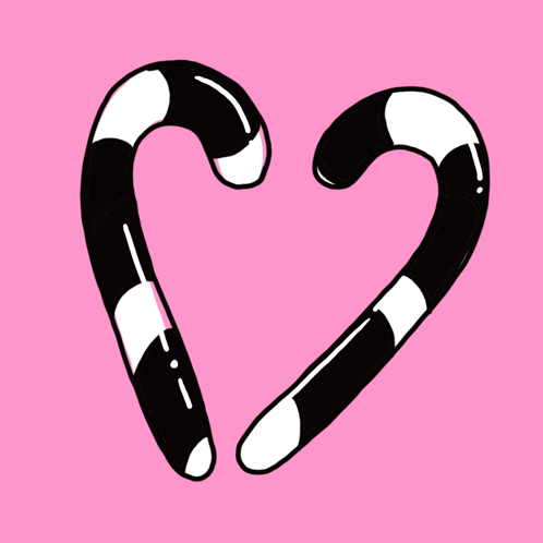 Two Black And White Candy Canes On A Pink Background GIF