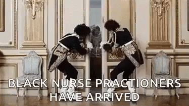 Two Black Nurse Practitioners Standing