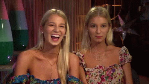 Two Blonde Women Laughing Smiling