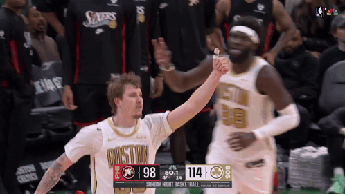 Two Boston Basketball Players High Five