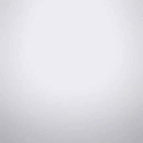Two Bottles Of Bitburger Premium Pils Are Shown Side By Side GIF