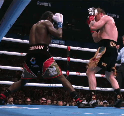 two boxers are fighting in a ring that says omaha on it