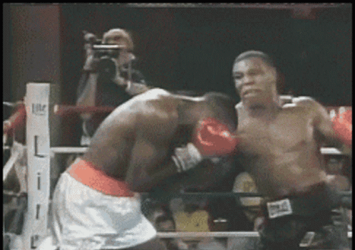 Two Boxers Fighting In Ring GIF