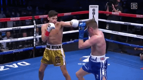 Two Boxers Fighting in Ring With OG Shorts