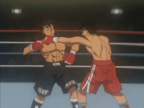 Two Boxers Fighting, One With Number 1 Shorts GIF