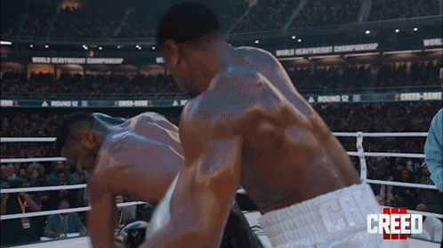 Two Boxers in Creed Ring
