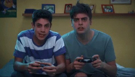 Two Boys Enjoying Video Playstation GIF